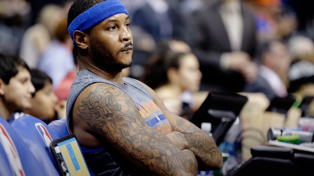 New York Knicks' Carmelo Anthony sits on the bench before the start of an NBA basketball game against the Atlanta Hawks, Dec. 26, 2015, in Atlanta. (Photo by David Goldman/AP)