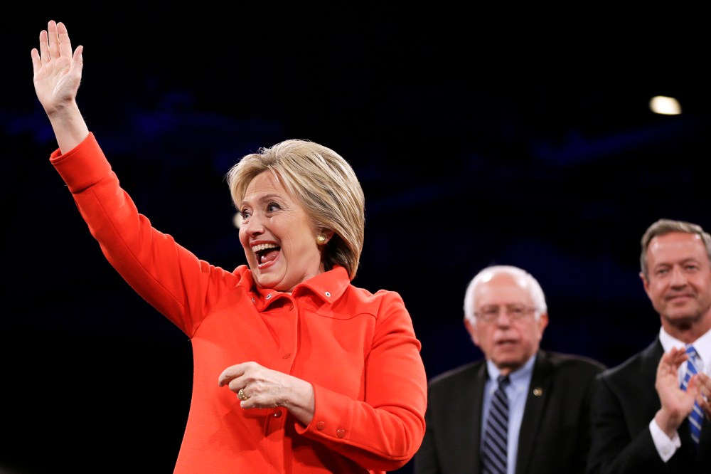 Democratic presidential candidate Hillary Rodham Clinton waves to supporters during the Iowa Democratic Party's Jefferson-Jackson Dinner, Oct. 24, 2015, in Des Moines, Iowa. (Photo by Charlie Neibergall/AP)