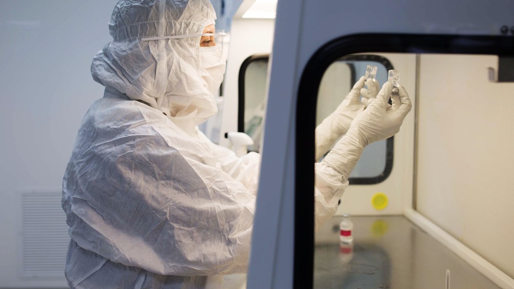 A chemist works inside Imprimis Pharmaceuticals in Irvine, Calif. (Photo by Joel Morillo/Passage Productions/AP)