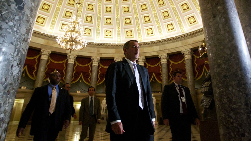 House Speaker John Boehner of Ohio, walks to the House Floor at the U.S. Capitol in Washington, D.C., Sept. 28, 2013. (Photo by Molly Riley/AP)