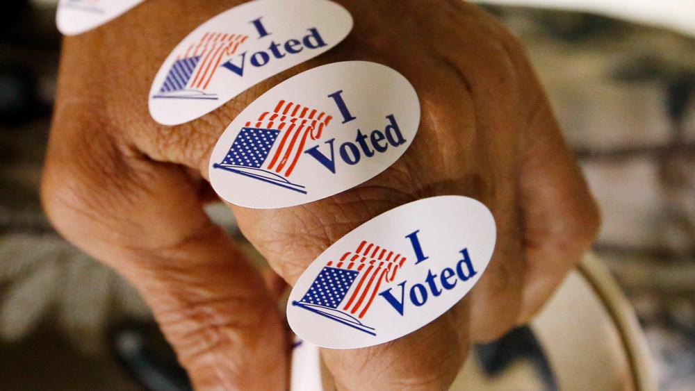 "I Voted" stickers are seen ready to distribute to all who exit the voting booths, Aug. 4, 2015. (Photo by Rogelio V. Solis/AP)