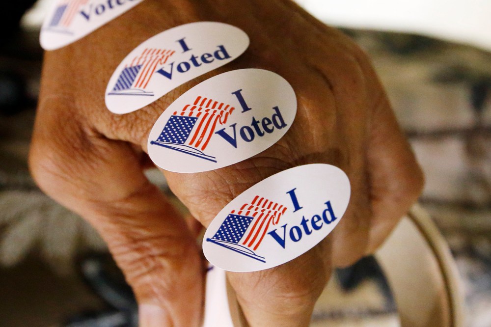 "I Voted" stickers are seen ready to distribute to all who exit the voting booths, Aug. 4, 2015. (Photo by Rogelio V. Solis/AP)