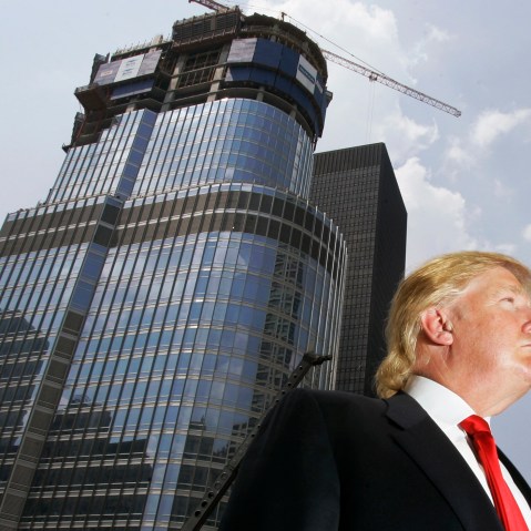 Donald Trump is profiled against his 92-story Trump International Hotel & Tower during a news conference on construction progress in Chicago, Ill. on May 24, 2007. (Photo by Charles Rex Arbogast/AP)