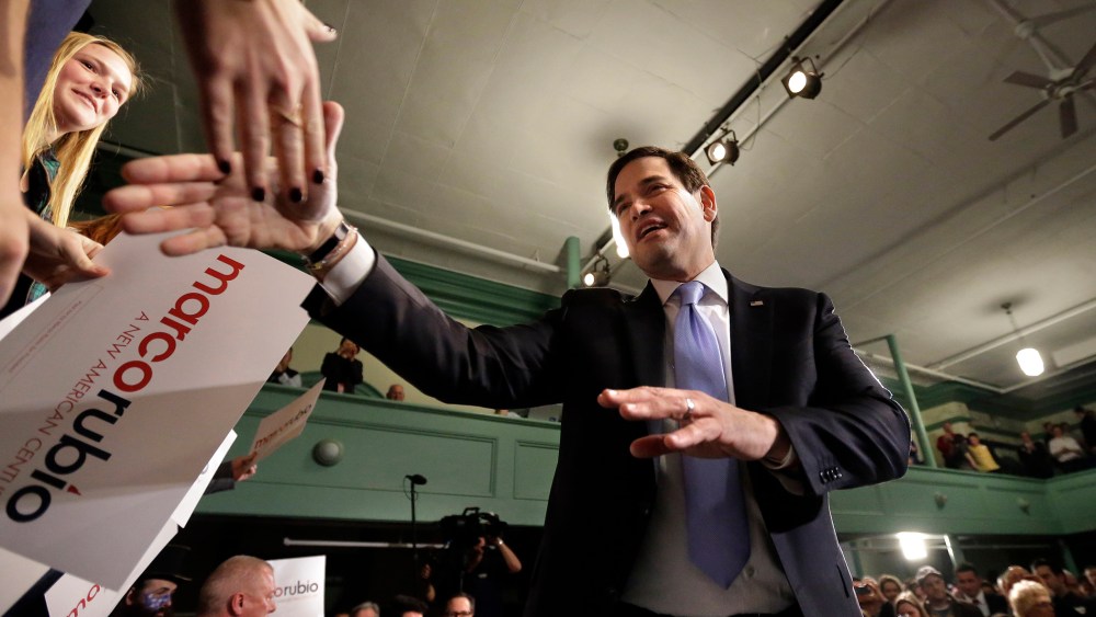 Republican presidential candidate, Sen. Marco Rubio, R-Fla., shakes hands with members of the audience at the conclusion of a campaign event, Feb. 2, 2016, in Exeter, N.H. (Photo by Steven Senne/AP)