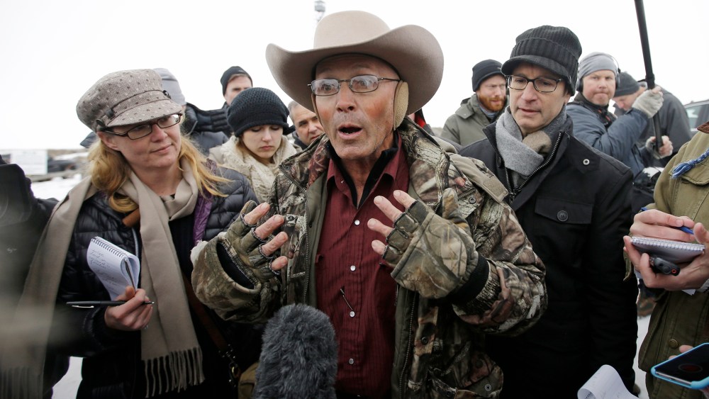 LaVoy Finicum, a rancher from Arizona, who is part of the militia occupying the Malheur National Wildlife Refuge, speaks with reporters, Jan. 5, 2016, near Burns, Ore. (Photo by Rick Bowmer/AP)