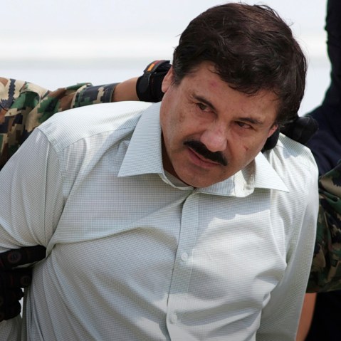 This Feb. 22, 2014 file photo shows Joaquin "El Chapo" Guzman, the head of Mexico's Sinaloa Cartel, following his capture in the beach resort town of Mazatlan. (Photo by Eduardo Verdugo/AP)