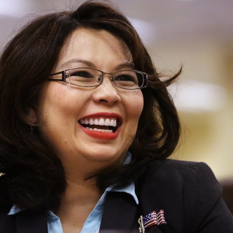 In this Aug. 13, 2014 file photo, Rep. Tammy Duckworth, D-Ill., acknowledges applause in Springfield, Ill. (Photo by Seth Perlman/AP)