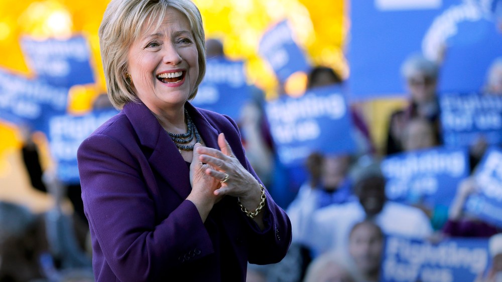 Democratic presidential candidate Hillary Rodham Clinton smiles to supporters, Nov. 9, 2015, in Concord, N.H. (Photo by Jim Cole/AP)