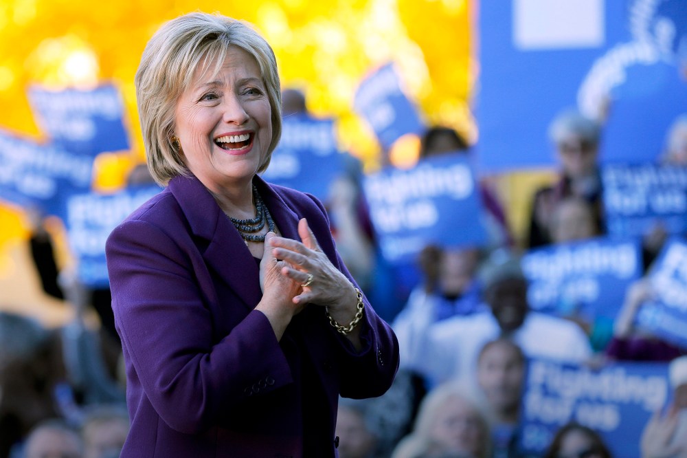 Democratic presidential candidate Hillary Rodham Clinton smiles to supporters, Nov. 9, 2015, in Concord, N.H. (Photo by Jim Cole/AP)