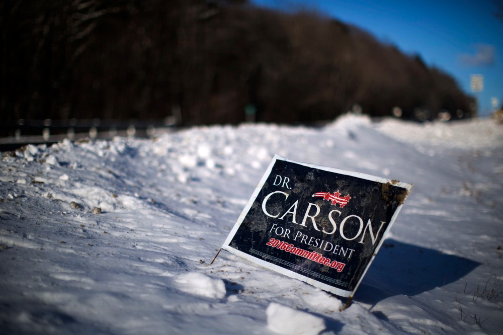 A sign is posted in newly fallen snow for Republican presidential candidate Dr. Ben Carson, Jan. 13, 2016, along a roadside in Peterborough, N.H. (Photo by Matt Rourke/AP)