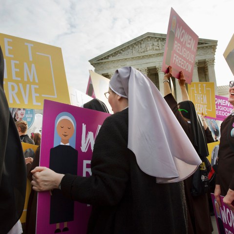 Nuns of the Order of St. Francis, from Mishawaka, Ind., rally outside the Supreme Court in Washington, March 23, 2016. (Photo by Jacquelyn Martin/AP)