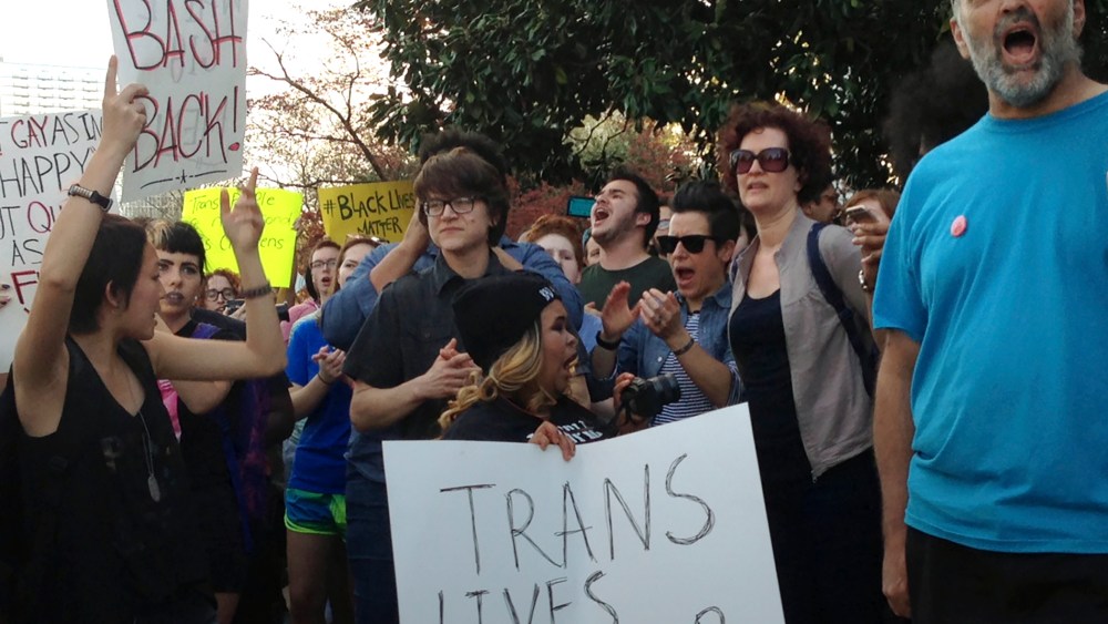 People protest outside the North Carolina Executive Mansion in Raleigh, N.C., March 24, 2016. (Photo by Emery P. Dalesio/AP)