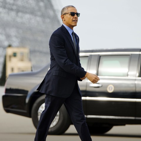 President Barack Obama walks to board Air Force One at Moffett Federal Airfield in Mountain View, Calif., Feb. 11, 2016. (Photo by Pablo Martinez Monsivais/AP)