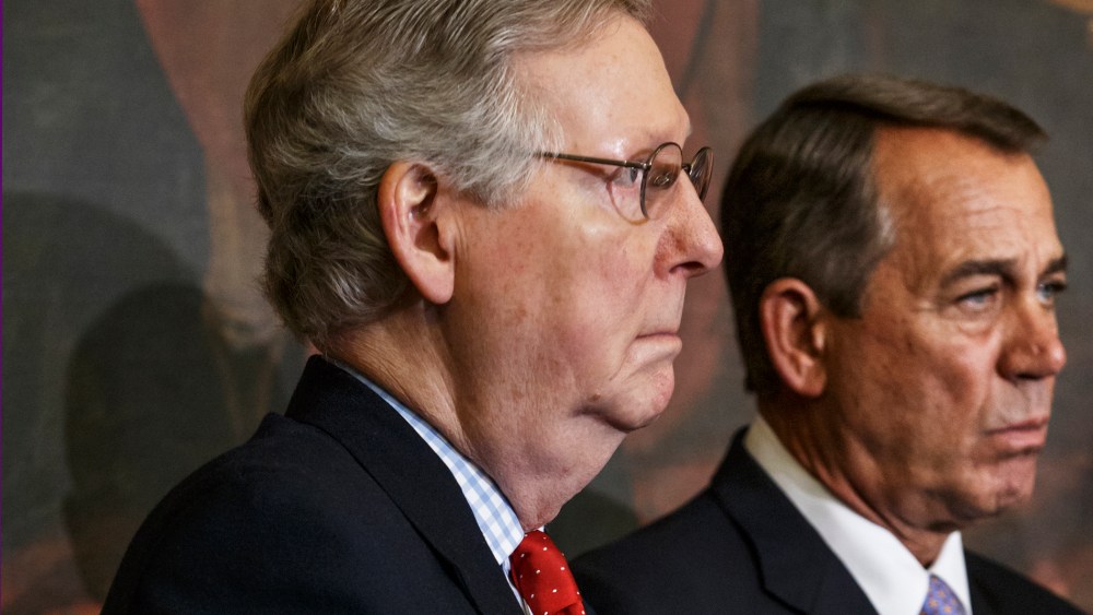 Senate Majority Leader Mitch McConnell of Ky., left, and House Speaker John Boehner of Ohio, stand together on Capitol Hill in Washington on Feb. 13, 2015. (Photo by J. Scott Applewhite/AP)
