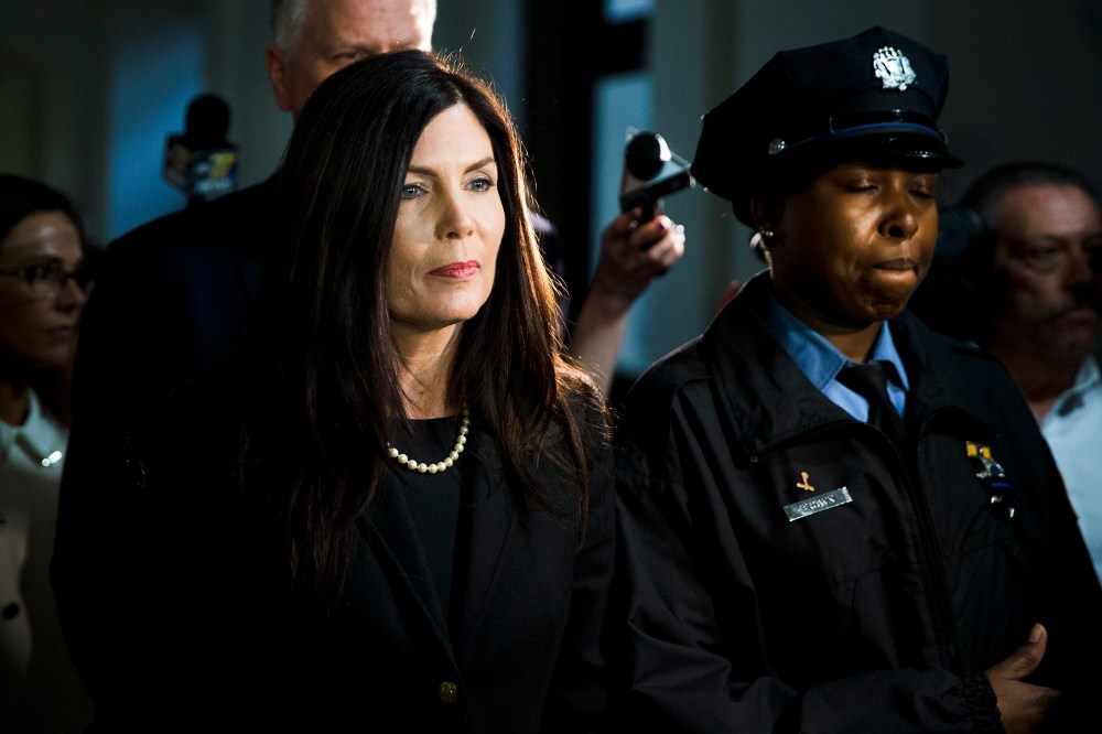 Pennsylvania Attorney General Kathleen Kane walks from the State Supreme Court room on Mar. 11, 2015, at City Hall in Philadelphia (Photo by Matt Rourke/AP).