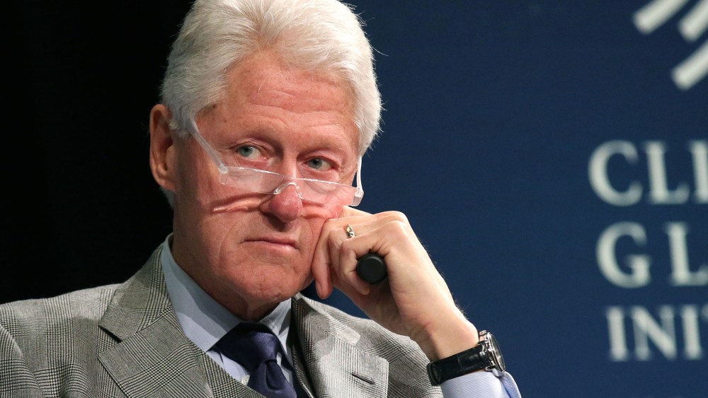 Former President Bill Clinton listens during a plenary session at the Clinton Global Initiative Winter Meeting on Feb. 10, 2015 in N.Y. (Photo by Greg Allen/Invision/AP)