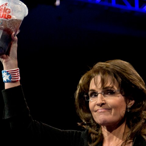 Former Alaska Gov. Sarah Palin holds up a 7-Eleven Super Big Gulp soda on stage at the 40th annual Conservative Political Action Conference in National Harbor, Md., Saturday, March 16, 2013. Earlier in the week a New York judge struck down a ban...