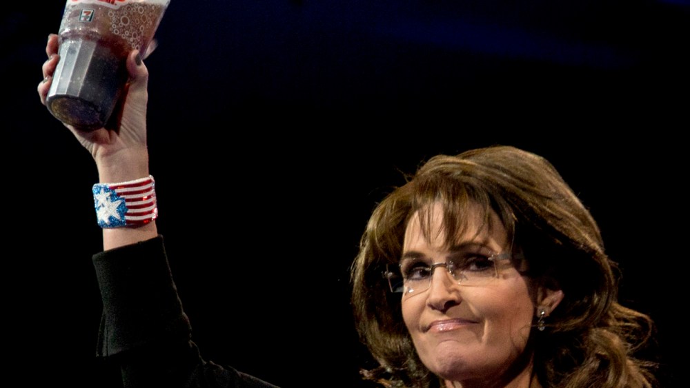 Former Alaska Gov. Sarah Palin holds up a 7-Eleven Super Big Gulp soda on stage at the 40th annual Conservative Political Action Conference in National Harbor, Md., Saturday, March 16, 2013. Earlier in the week a New York judge struck down a ban...