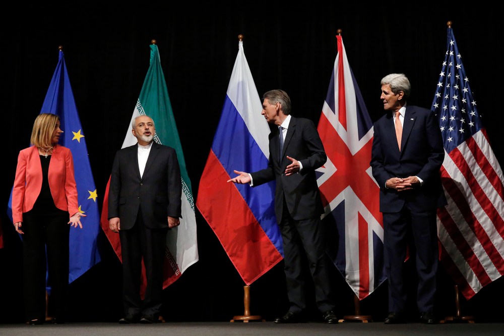 (Photo by Carlos Barria/Pool/AP)