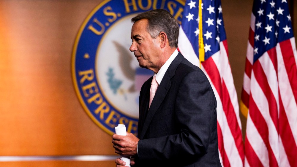 John Boehner leaves a news conference on Capitol Hill in Washington, Thursday, July 10, 2014.