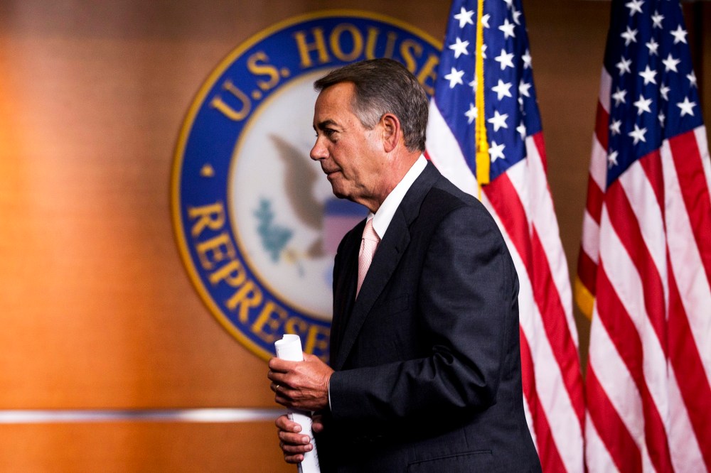 John Boehner leaves a news conference on Capitol Hill in Washington, Thursday, July 10, 2014.