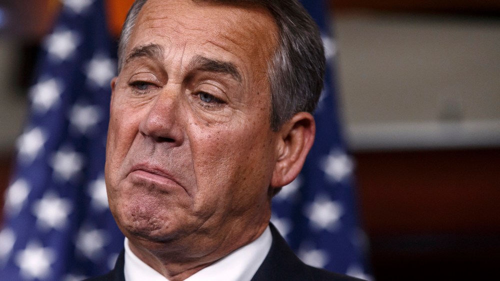 House Speaker John Boehner of Ohio pauses while meeting with reporters on Capitol Hill in Washington, Thursday, Jan. 16, 2014.
