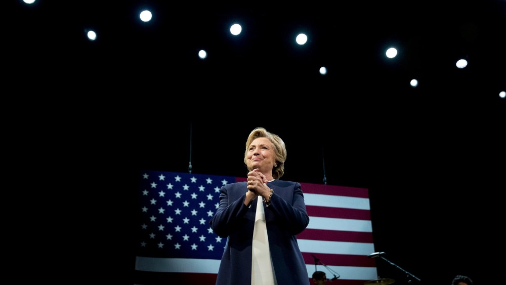 Democratic presidential candidate Hillary Clinton takes the stage at a fundraiser at the Civic Center Auditorium in San Francisco, Calif., Oct. 13, 2016. (Photo by Andrew Harnik/AP)