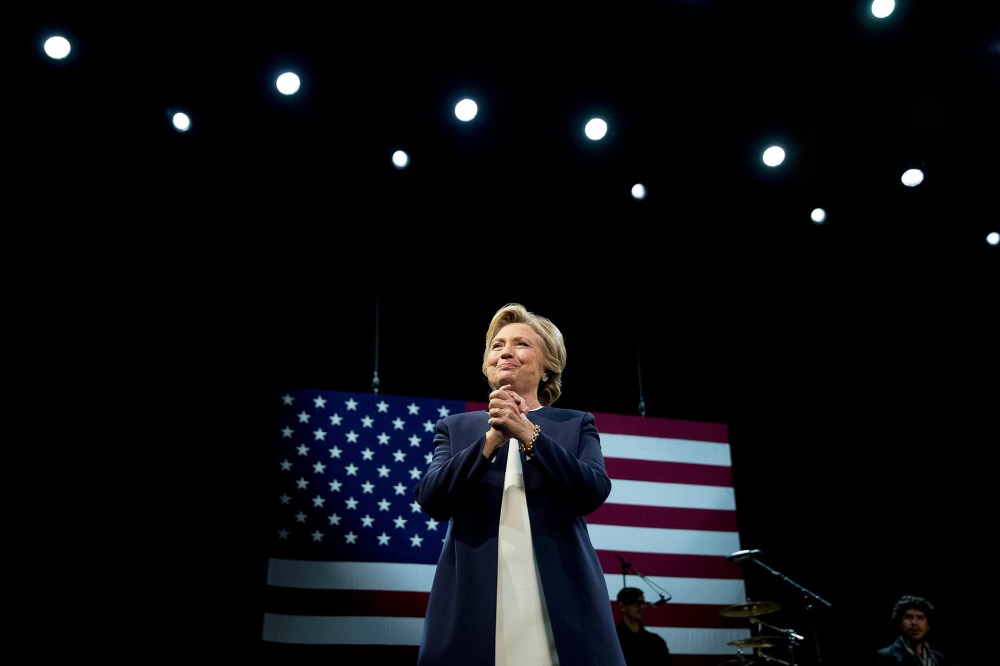Democratic presidential candidate Hillary Clinton takes the stage at a fundraiser at the Civic Center Auditorium in San Francisco, Calif., Oct. 13, 2016. (Photo by Andrew Harnik/AP)