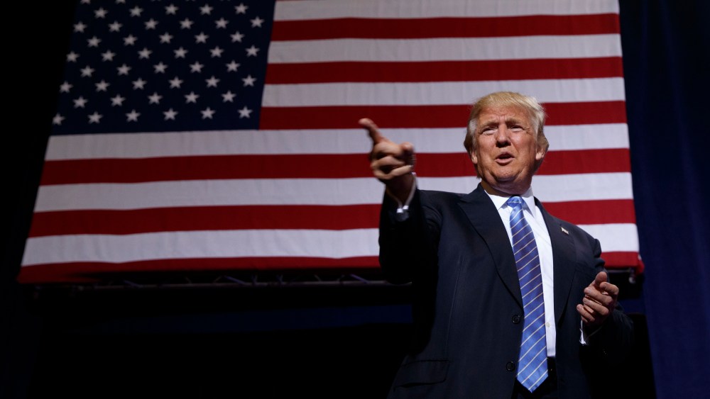 Republican presidential candidate Donald Trump arrives to deliver an immigration policy speech during a campaign rally at the Phoenix Convention Center, Aug. 31, 2016, in Phoenix. (Photo by Evan Vucci/AP)