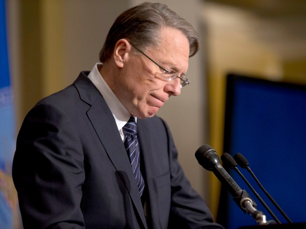 National Rifle Association executive vice president Wayne LaPierre pauses as he makes a statement during a news conference in response to the Connecticut school shooting, on Dec. 21, 2012 in Washington, D.C. (Photo by Evan Vucci/AP)