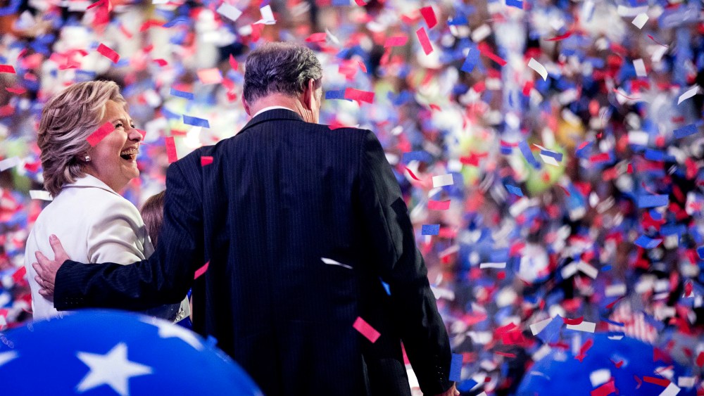 Democratic presidential candidate Hillary Clinton and Democratic vice presidential candidate, Sen. Tim Kaine, D-Va., right, stand on stage on the final day of the Democratic National Convention in Philadelphia, Pa., July 28, 2016. (Andrew Harnik/AP)