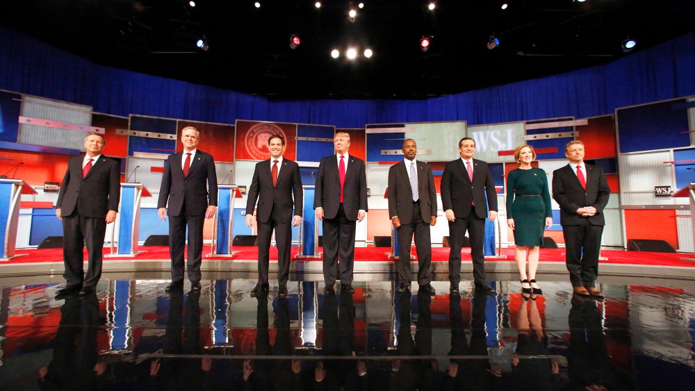 Republican presidential candidates John Kasich, Jeb Bush, Marco Rubio, Donald Trump, Ben Carson, Ted Cruz, Carly Fiorina and Rand Paul take the stage before the Republican presidential debate, Nov. 10, 2015, in Milwaukee. (Photo by Jeffrey Phelps/AP)