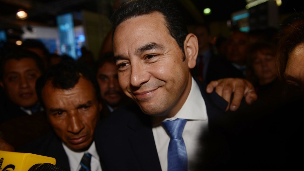 Jimmy Morales, the National Front of Convergence party presidential candidate, arrives to the Electoral Supreme Court headquarters in Guatemala City, Oct. 25, 2015. (Photo by Oliver de Ros/AP)