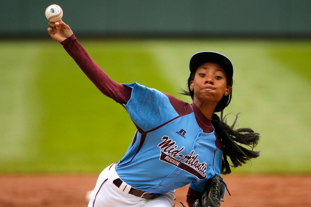 Pennsylvania's Mo'ne Davis delivers in the first inning against Tennessee during a baseball game in United States pool play at the Little League World Series tournament in South Williamsport, Pa., Friday, Aug. 15, 2014.