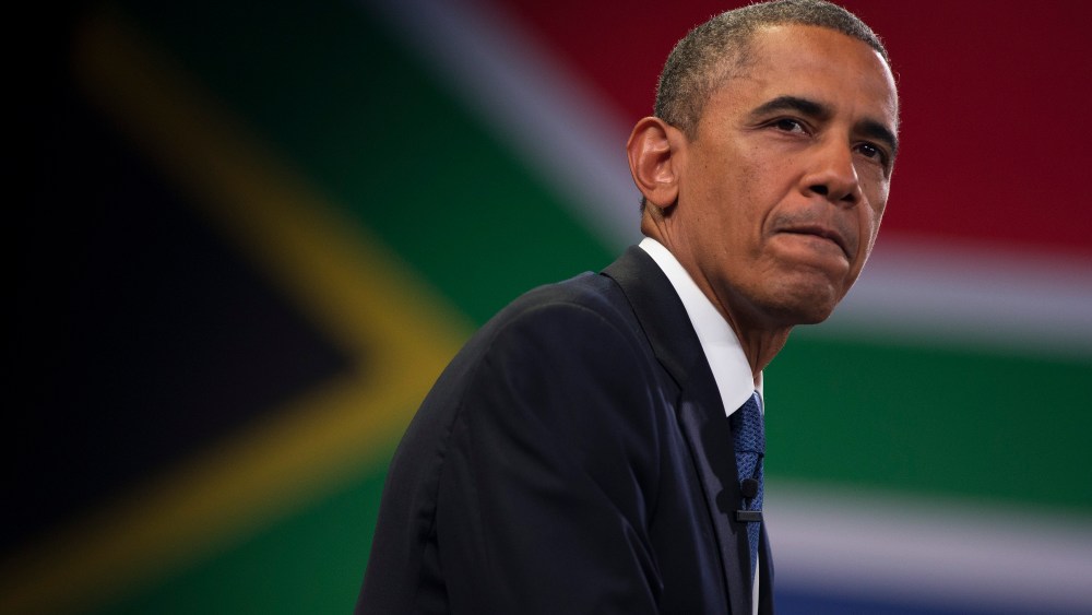 U.S. President Barack Obama pauses during a town hall meeting with young African leaders at the University of Johannesburg Soweto on Saturday, June 29, 2013, in Johannesburg, South Africa. (AP Photo/Evan Vucci)