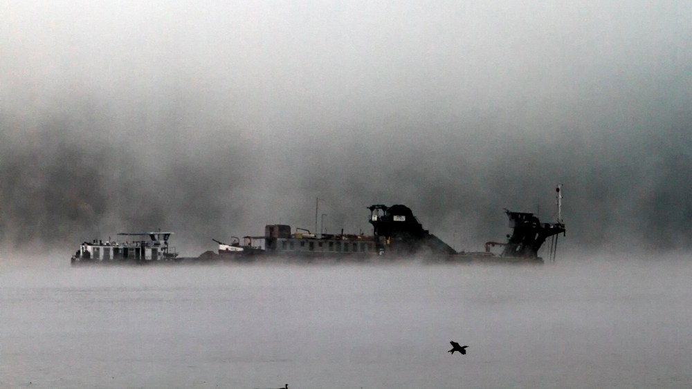 A ship on a foggy morning.