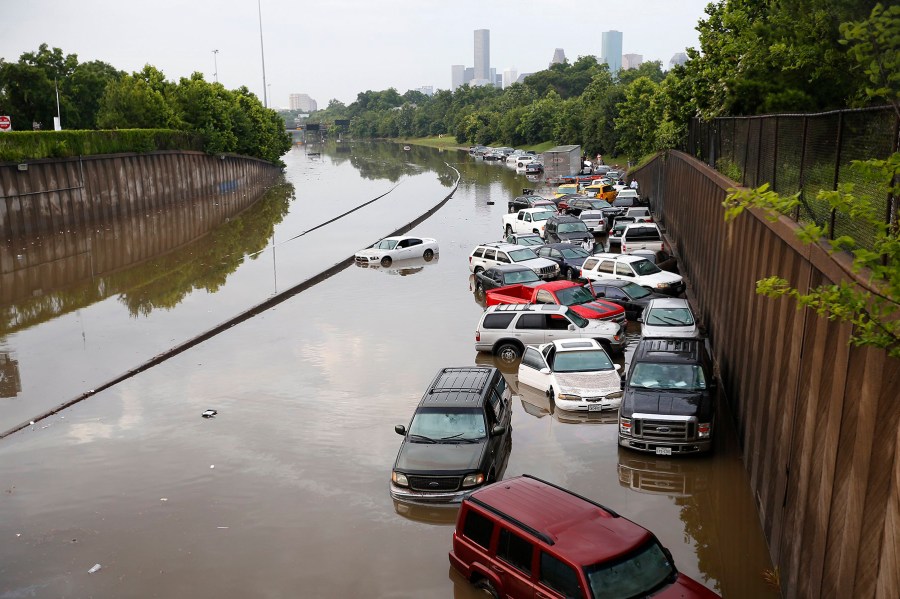 Motorists are stranded along I-45 along North Main in Houston after storms flooded the area, Tuesday, May 26, 2015. Overnight heavy rains caused flooding closing some portions of major highways in the Houston area. (Cody Duty/Houston Chronicle/AP)