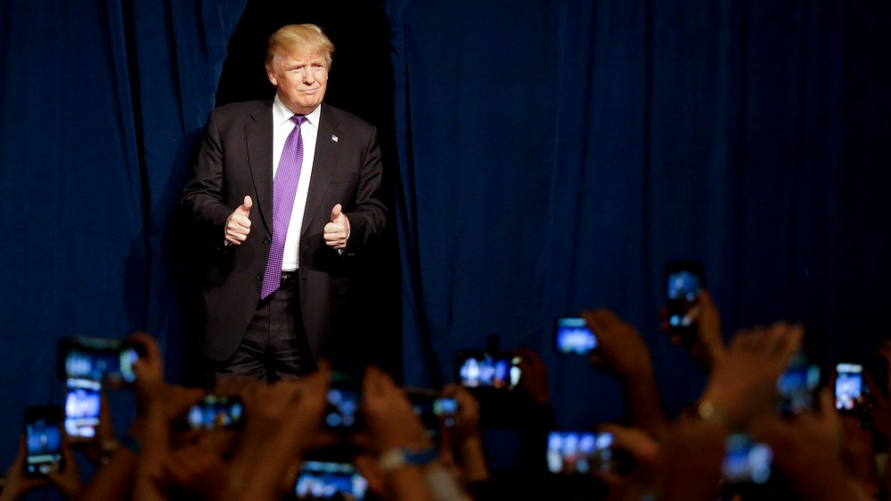 Republican presidential candidate Donald Trump arrives for a caucus night rally, Feb. 23, 2016, in Las Vegas, Nev. (Photo by Jae C. Hong/AP)
