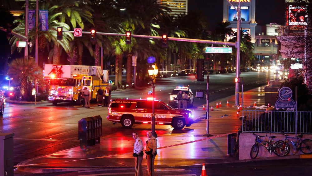 Police and emergency crews respond to the scene of a car accident along Las Vegas Boulevard, Dec. 20, 2015, in Las Vegas, Nev. (Photo by John Locher/AP)