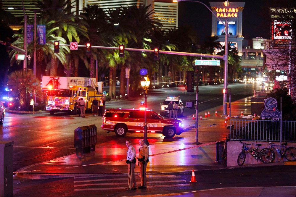 Police and emergency crews respond to the scene of a car accident along Las Vegas Boulevard, Dec. 20, 2015, in Las Vegas, Nev. (Photo by John Locher/AP)