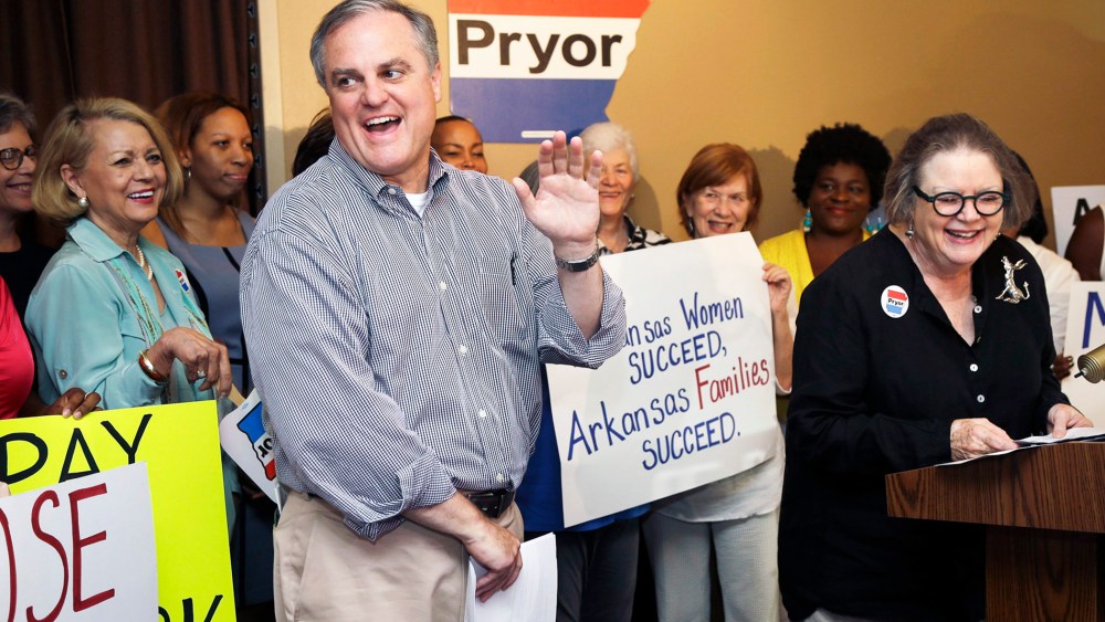 Sen. Mark Pryor, D-Ark., left, is introduced to a group of women supporters at a rally in Little Rock, Ark., Thursday, Aug. 28, 2014.