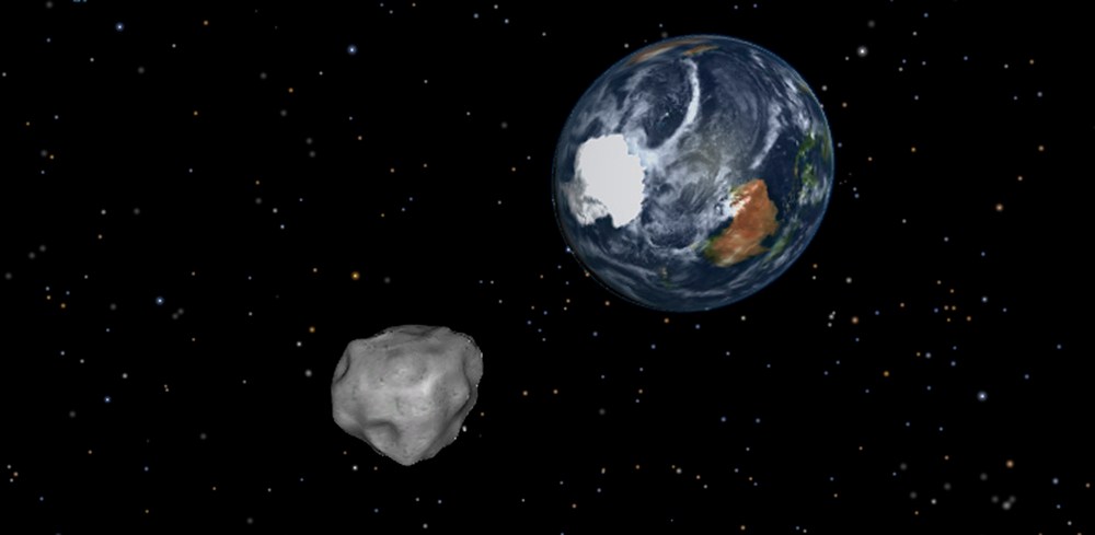This image provided by NASA/JPL-Caltech shows a simulation of asteroid 2012 DA14 approaching from the south as it passes through the Earth-moon system on Feb. 15, 2013. The 150-foot object will pass within 17,000 miles of the Earth. NASA scientists...