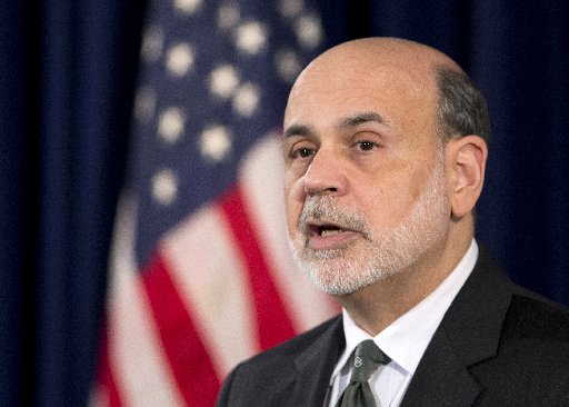 Federal Reserve Chairman Ben Bernanke speaks during a news conference at the Federal Reserve Board in Washington on Dec. 12, 2012. (Photo by Manuel Balce Ceneta/AP Photo)