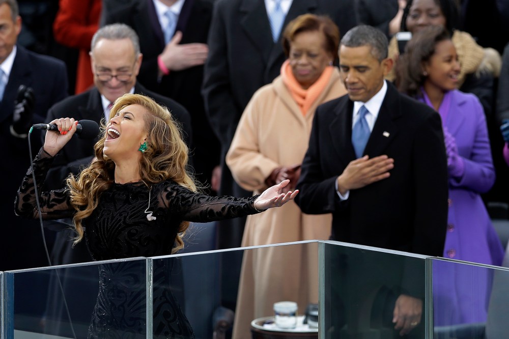President Barack Obama as Beyonce sings the National Anthem at the ceremonial swearing-in at the U.S. Capitol during the 57th Presidential Inauguration in Washington, Monday, Jan. 21, 2013. (Photo by Carolyn Kaster/AP)