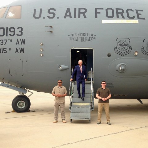Vice President Joe Biden steps off a C-17 military transport plane upon his arrival in Baghdad, Iraq, Thursday, April 28, 2016. (Photo by Josh Lederman/AP)