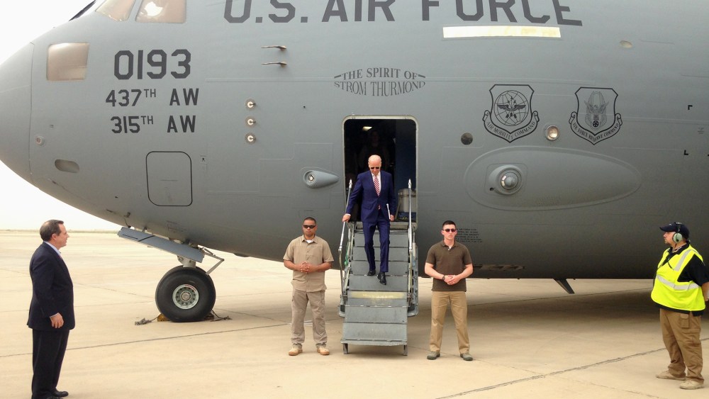 Vice President Joe Biden steps off a C-17 military transport plane upon his arrival in Baghdad, Iraq, Thursday, April 28, 2016. (Photo by Josh Lederman/AP)