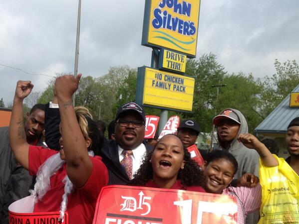 Fast food workers and Reverend Charles Williams II (center) picket a Long John Silver's in Detroit, Mich. on May 10, 2013. (Photo courtesy of Suzette Hackney, D15 coalition.)