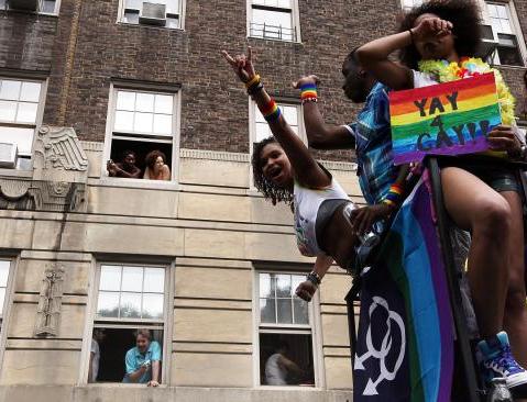 Revelers celebrate during the Gay Pride parade on June 26, 2011 in New York City. (Photo by Mario Tama/Getty Images)