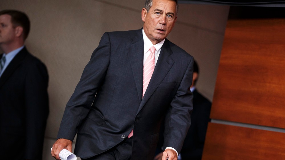 John Boehner arrives for a news conference on Capitol Hill in Washington, July 17, 2014.