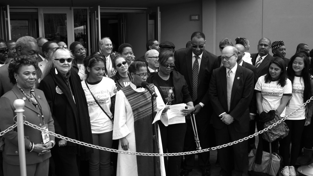 Officials break the chain signifying the reopening of the National Civil Rights Museum, April 5, 2014, in Memphis, Tenn.